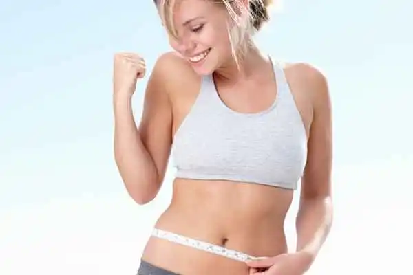 woman happy after fat reduction treatment Greater London (Richmond upon Thames)